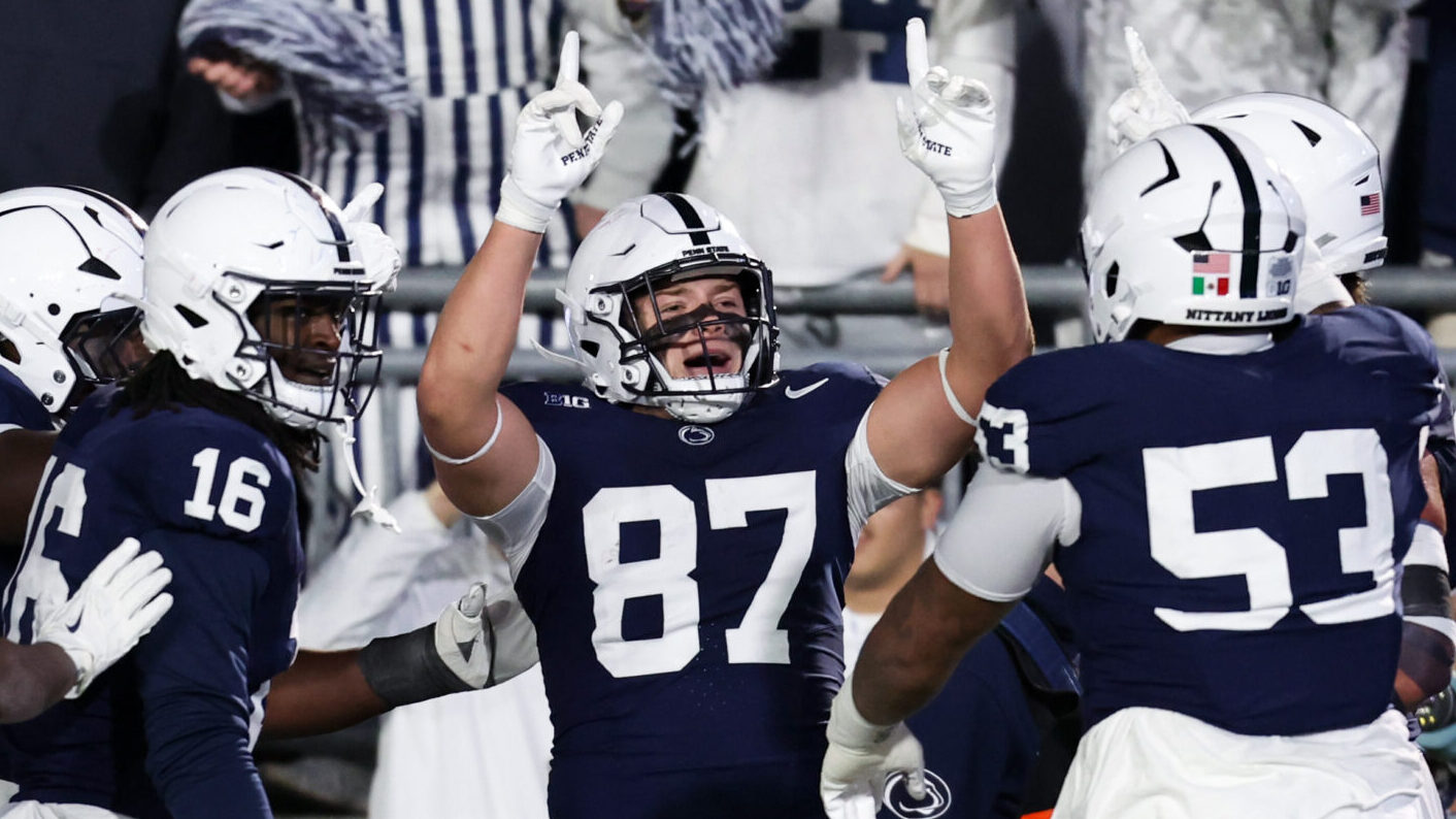 Penn State Football players celebrate during win over Nebraska, the Nittany Lions' second win under interim head coach Terry Smith during a late-season push for bowl eligibility.